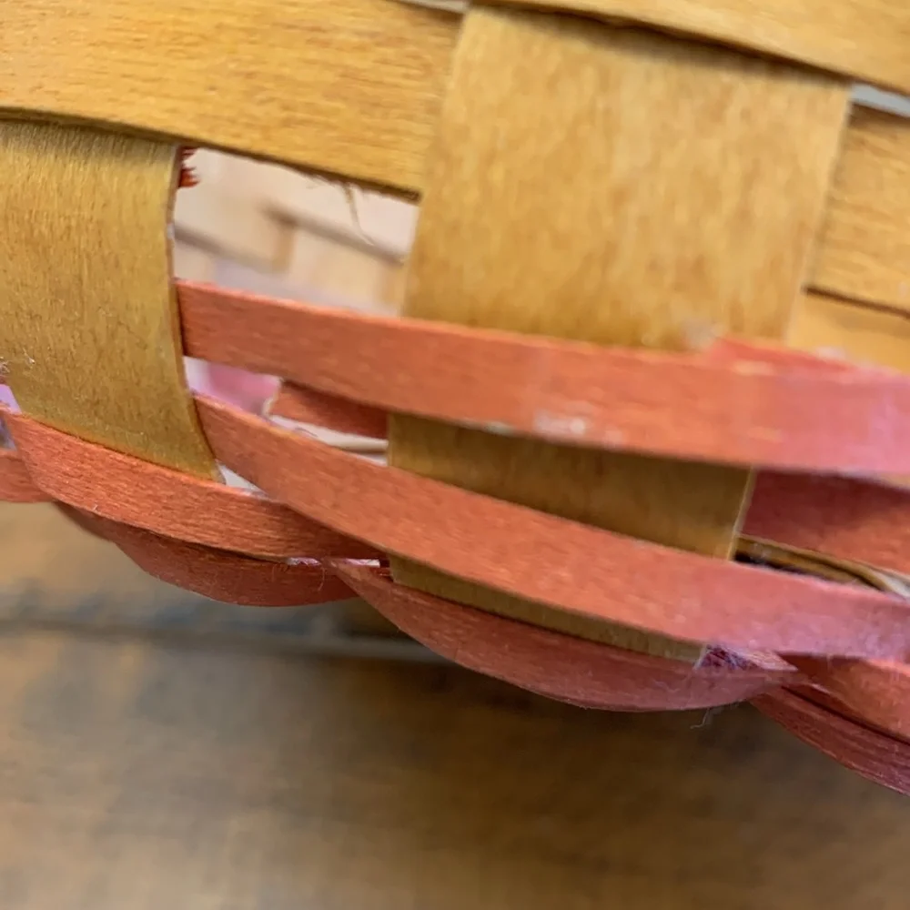 Longaberger Basket with Red Accent Weave. Single stationary handle.